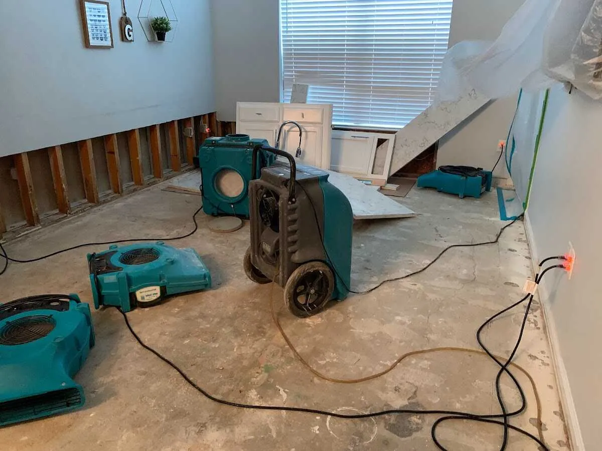 Dehumidifier in flood-cut room for Water Damage Restoration in Hastings